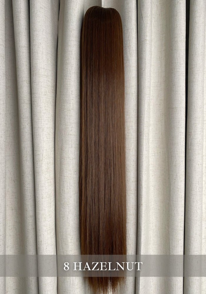 Anna | Synthetic Clip In Ponytail Extension