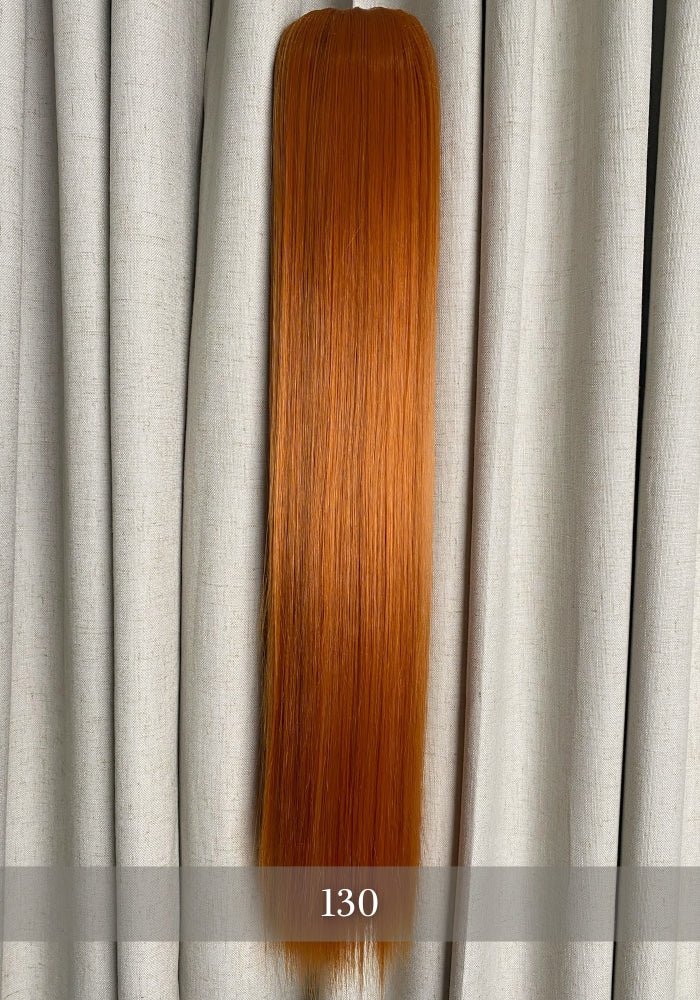 Anna | Synthetic Clip In Ponytail Extension